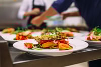Cooking a delicious main course in the restaurant kitchen