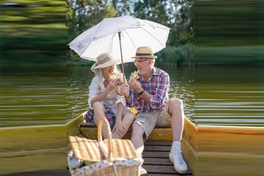 Couple sitting in little boat and enjoying river trip
